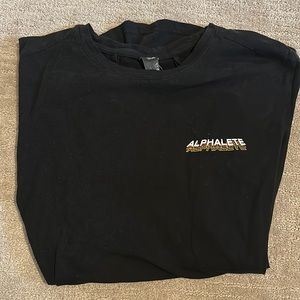 Alphalete short sleeve shirt in black, size large